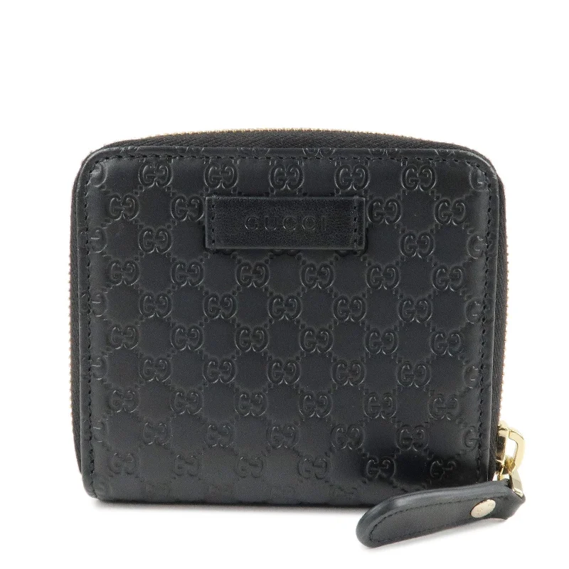 GUCCI Micro Guccissima Leather Bi-Fold Compact Wallet Black 449395